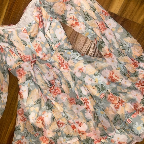 NWOT Floral Long Sleeve Romper with tie in the back and smocked sleeves - Picture 6 of 8